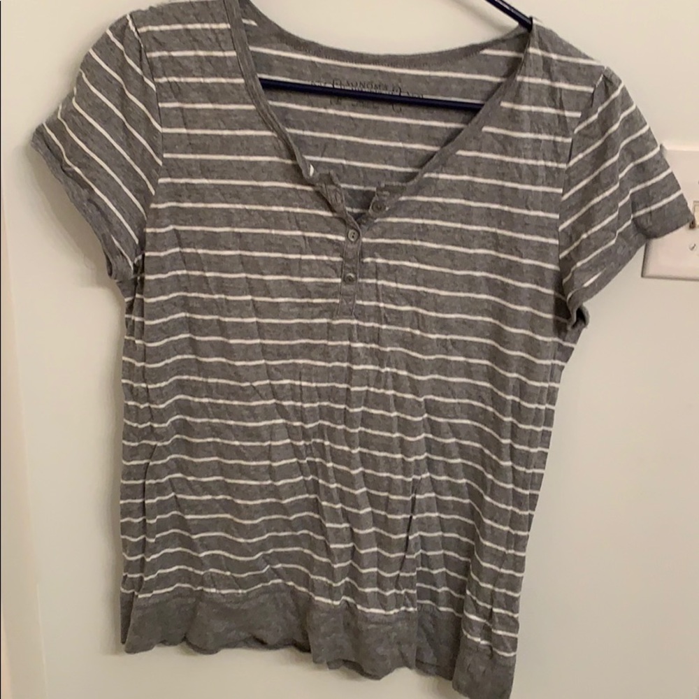 Striped shirt with top buttons